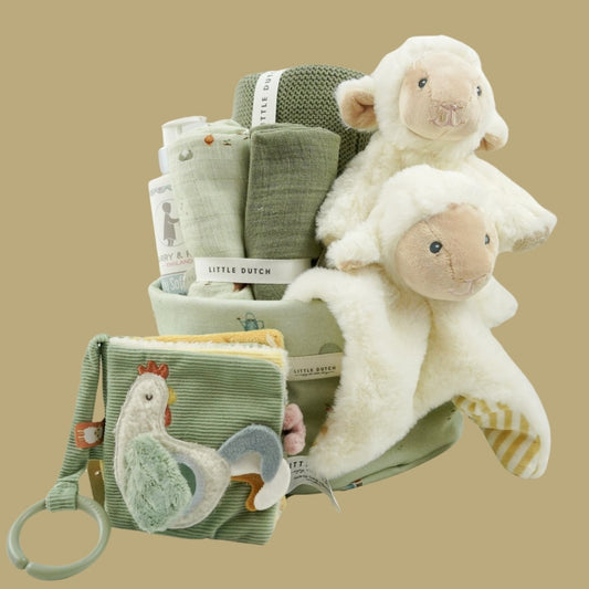 Little dutch farm basket in pale green, green little dutch blanket and farm  green and plae green baby muslin, Harry and Rose organic baby lotion, Farm animals pram book in green, Lamb comforter and lamb soft toy