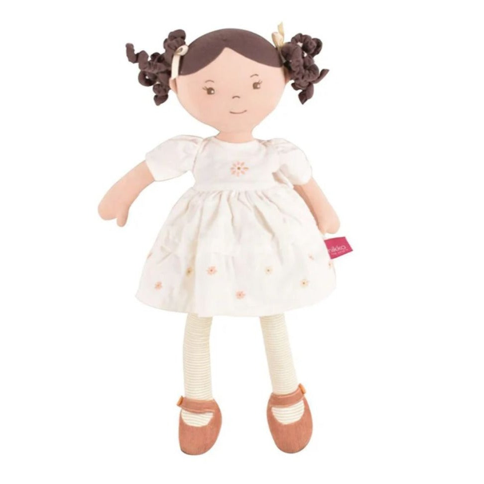rag doll in white dress with brown hair