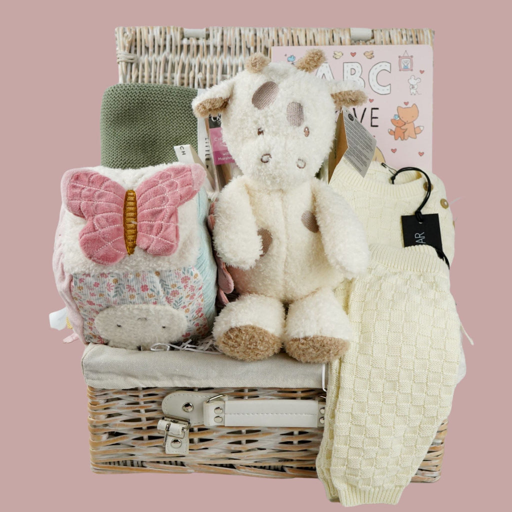 baby gifl hamper with soft cuddly teddy fleece giraffe soft toy, check cream organic cotton baby knit set, sage baby soft organic blanket, soft baby girl activity cube with miffy rabbit, ABC of Love baby board book