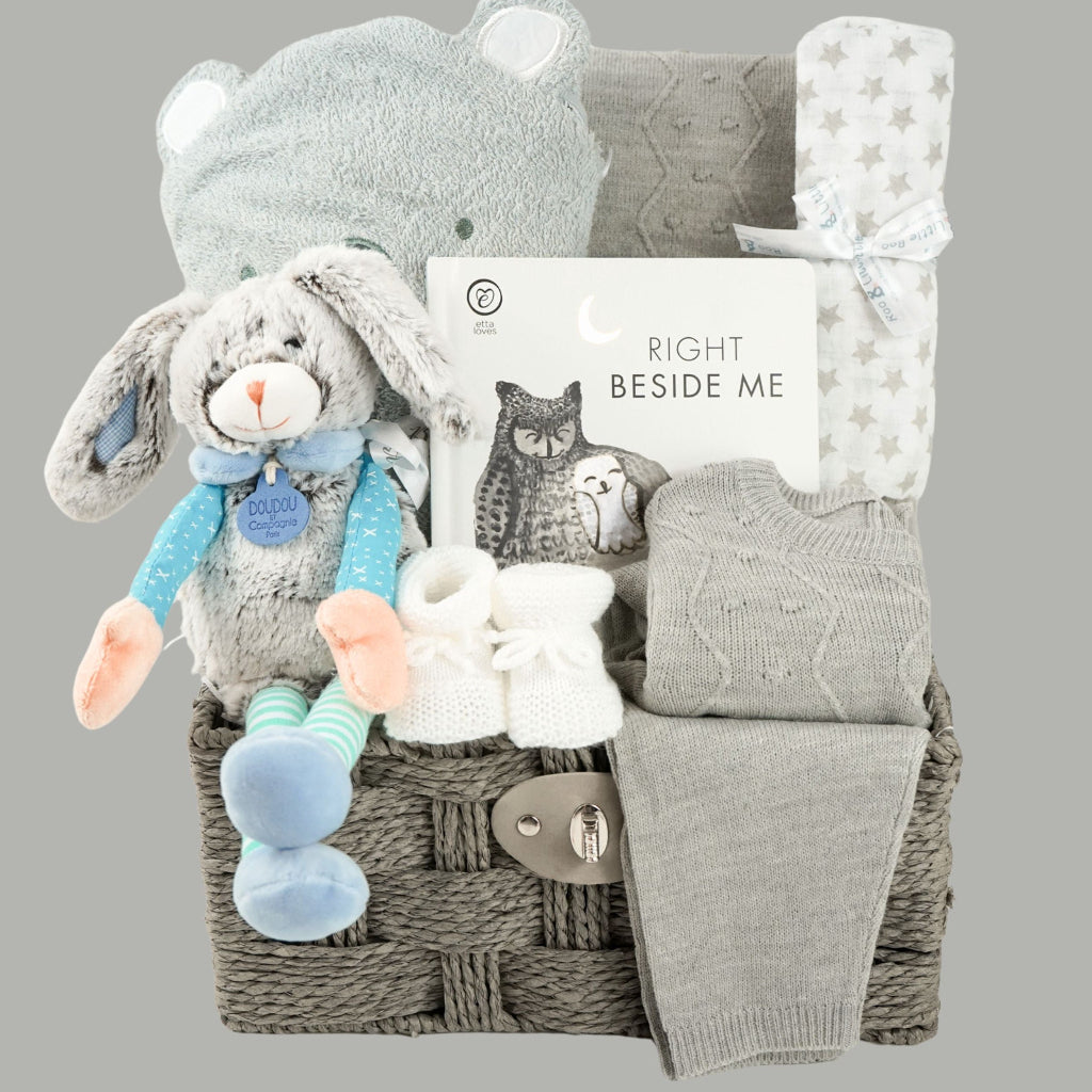 Neutral Baby Hamper Gift With Soft grey bunny doudou toy , knitted clothing set with matching blanket, baby black and white board book, koala hooded towel, white booties, white and grey muslin square