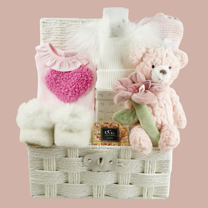 luxury baby girl hamper with baby utfit, hat, toiletries, teddy and chocolate