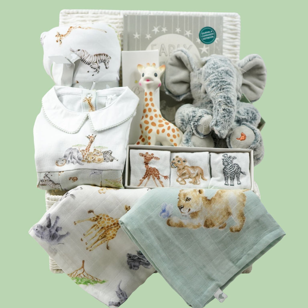 safari themed baby hamper gift with soft elephant plush, baby blanket and sleepsuit with safari animals, 3 paits of safari animal themed socks, 2 baby muslins, sophie la giraffe teether, baby bubble back, baby record book