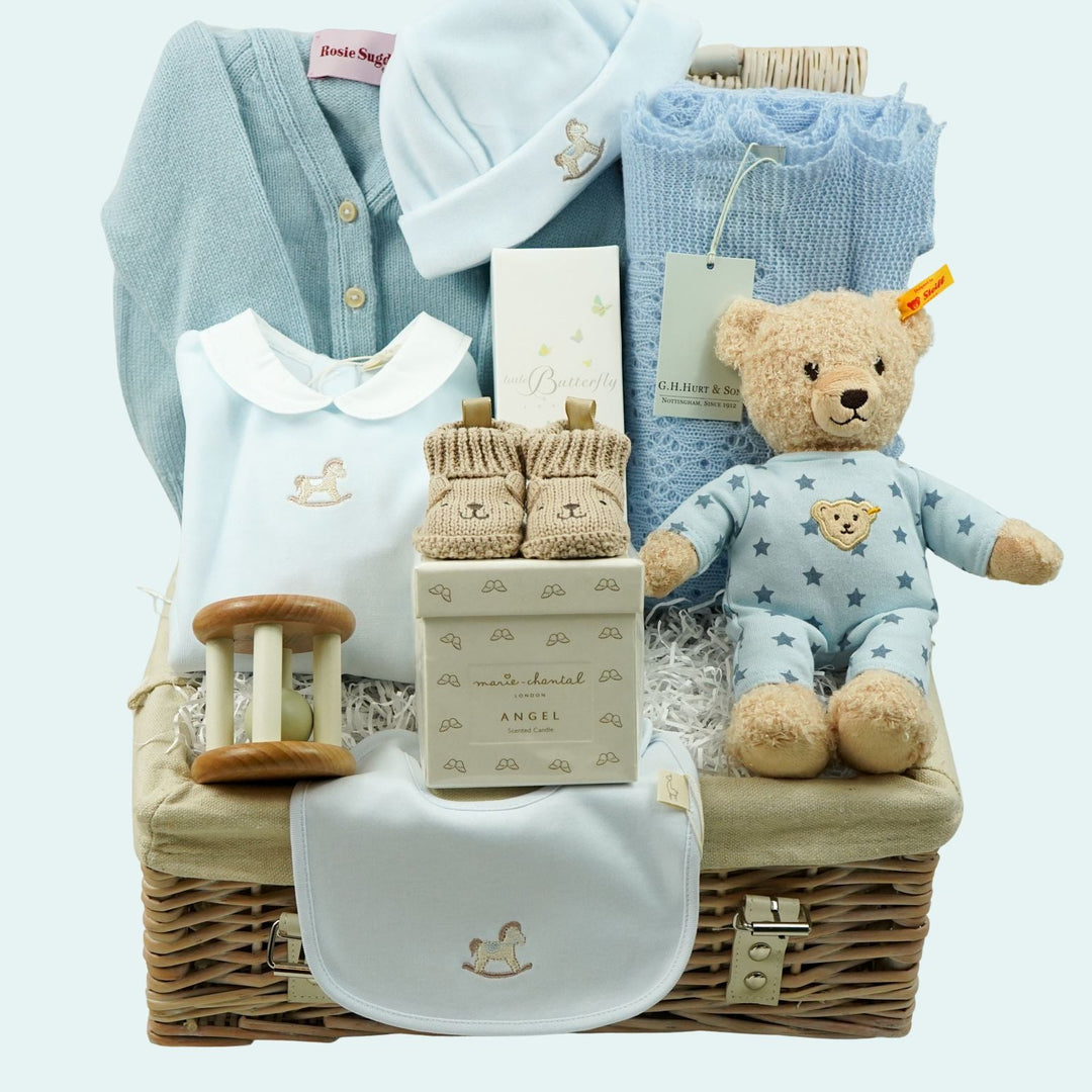 luxury baby boy gift, luxury blue velour clothing set with rocking horse embroidered, cashmere cardigan, cashmere shawl, Steiff teddy in blue  ajamas, luxury candle, baby toiletries, booties, wooden rattle