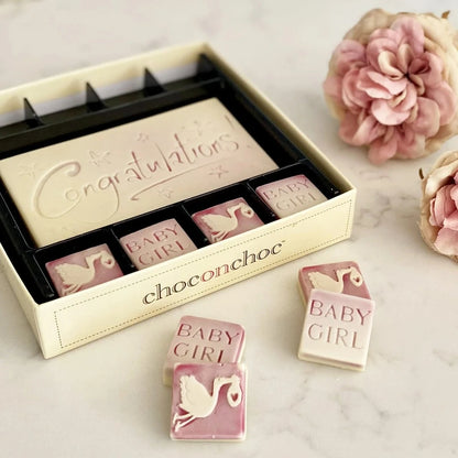 chocolates to celebrate a baby girl in pink and cream colour with storks