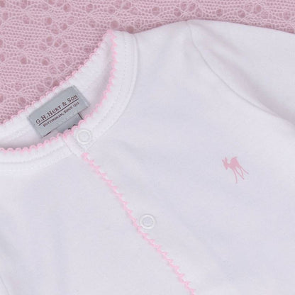 white luxury baby sleepsuit with a fawn logo and pink picot edging