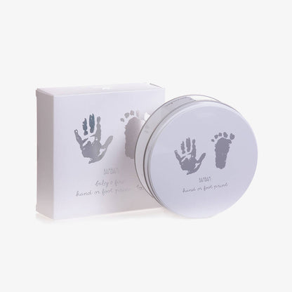Baby hand and footprint kit in a white tin with silver handprints