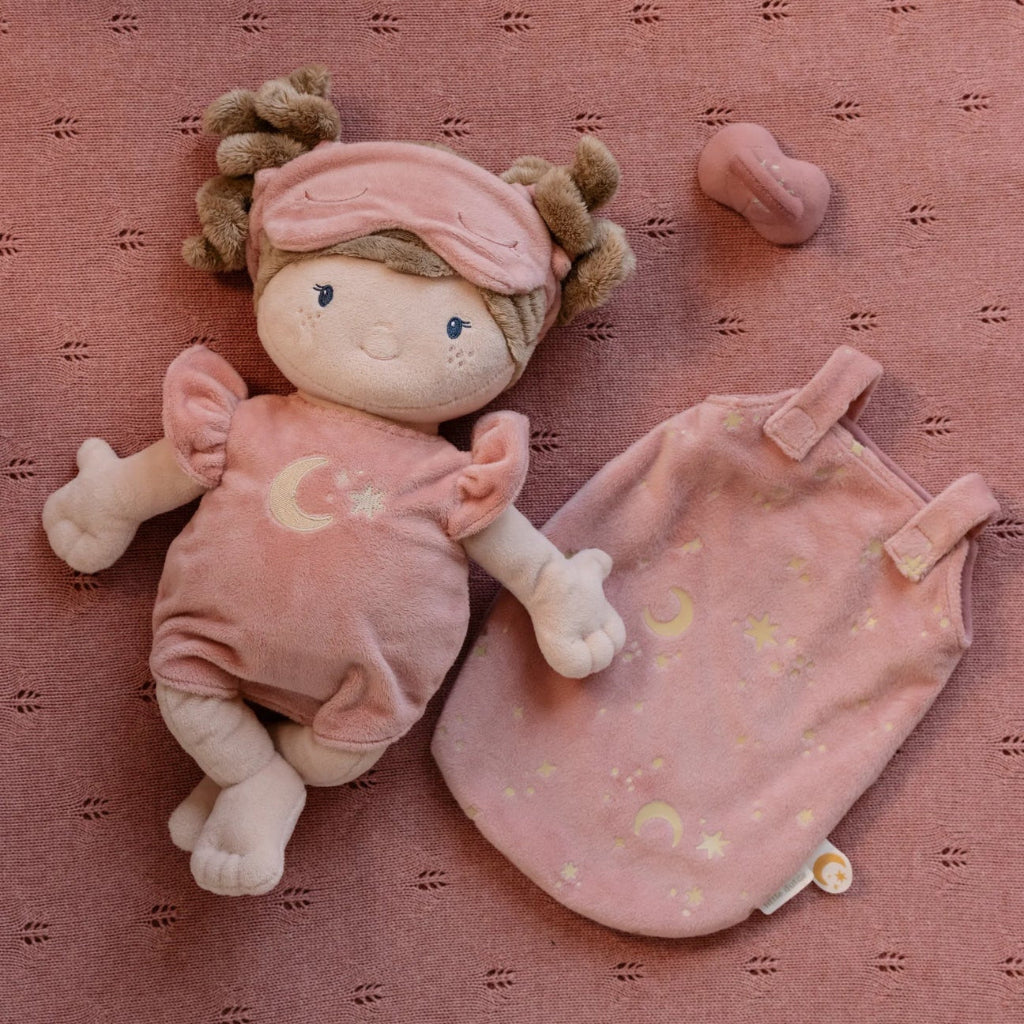 soft doll in sleeping bag