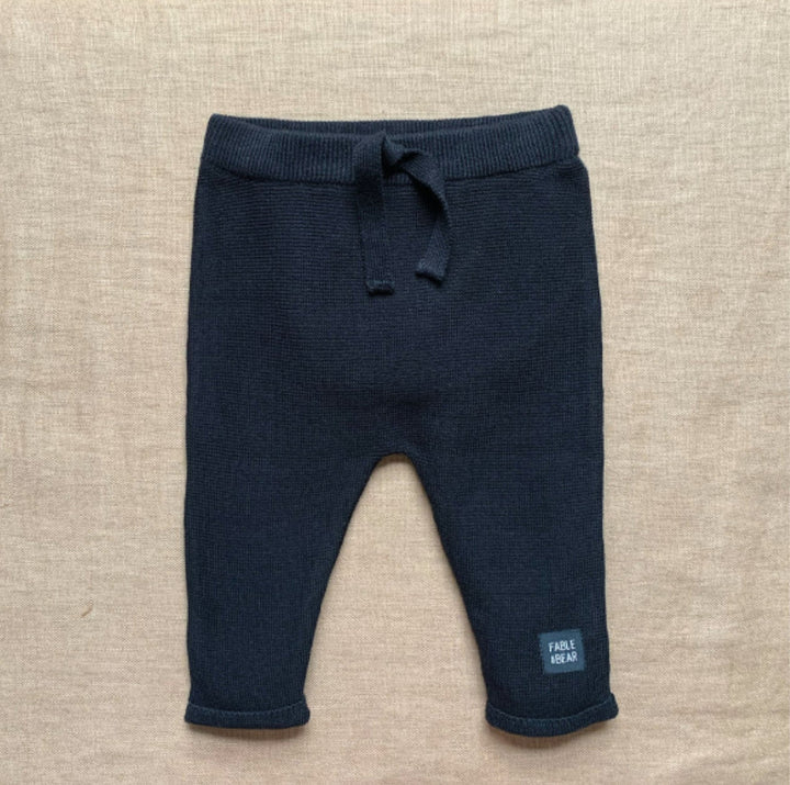 black baby joggers and cream baby joggers in organic cotton