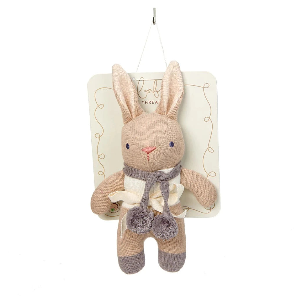 Soft brown baby bunny rattle soft toy with a grey knitted scar