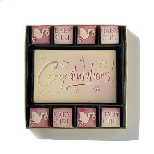 chocolates to celebrate a baby girl in pink and cream colour with storks 