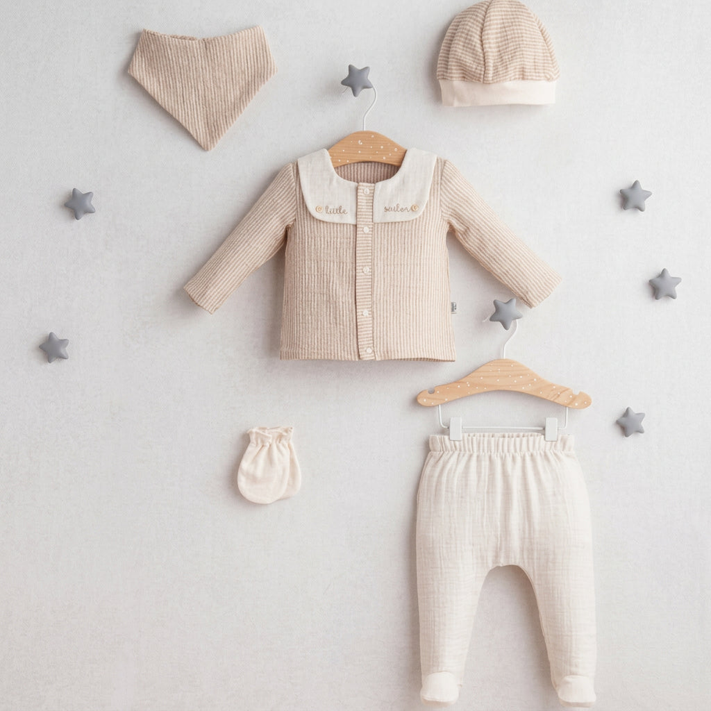 baby coffee coloured baby set includes a sailor style top , stiped hat and bib, mittens and leggings 
