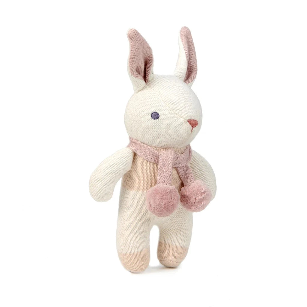 Organic baby soft knit toy in whote with pink clothing and matching bunny comforter