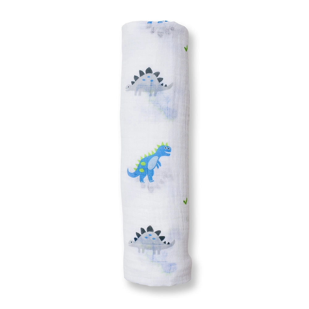Rolled-up fabric with dinosaur patterns on a white background