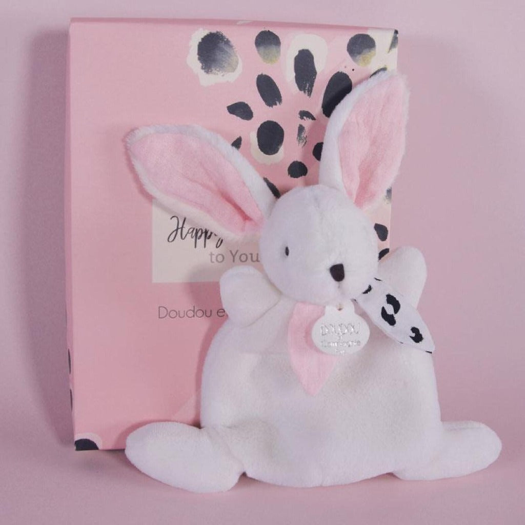 white and pink rabbit doudou comforter in a box