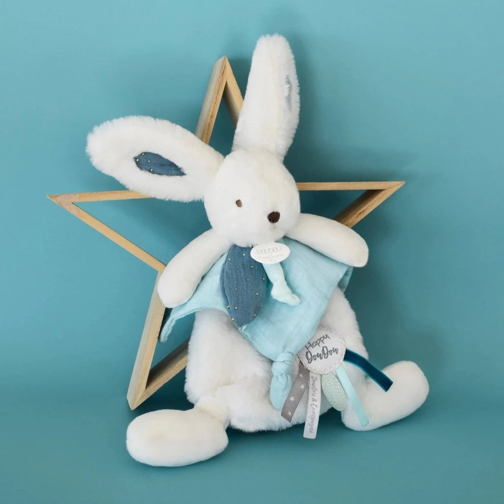 white rabbit dou dou with blue fluffy tail