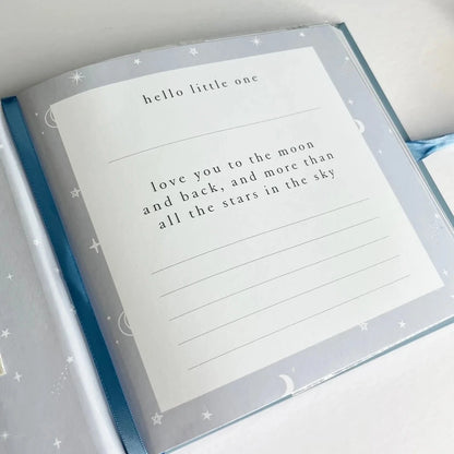 Dream big photo album for a baby, blue cover with gold writing and blue ribbon tie