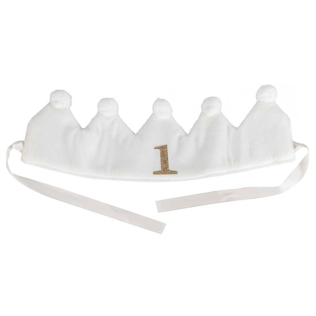 white fabric first birthday crown with white pom poms