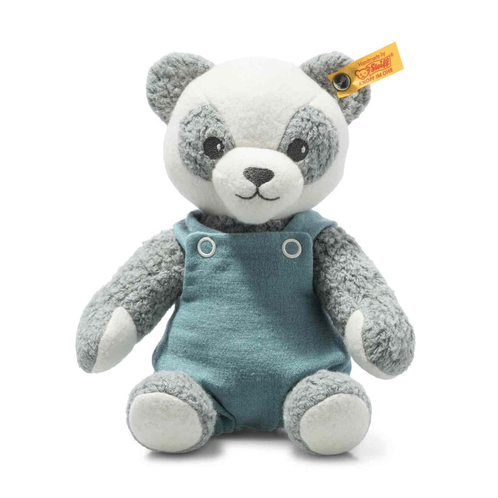Steiff GOTS grey and white panda  soft toy dressed in Turquoise dungarees
