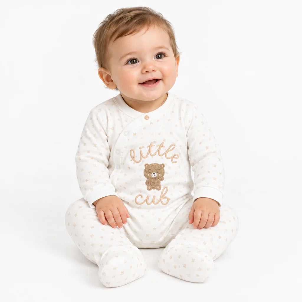 baby sleepsuit in white with little cub writing and a little cub applique 