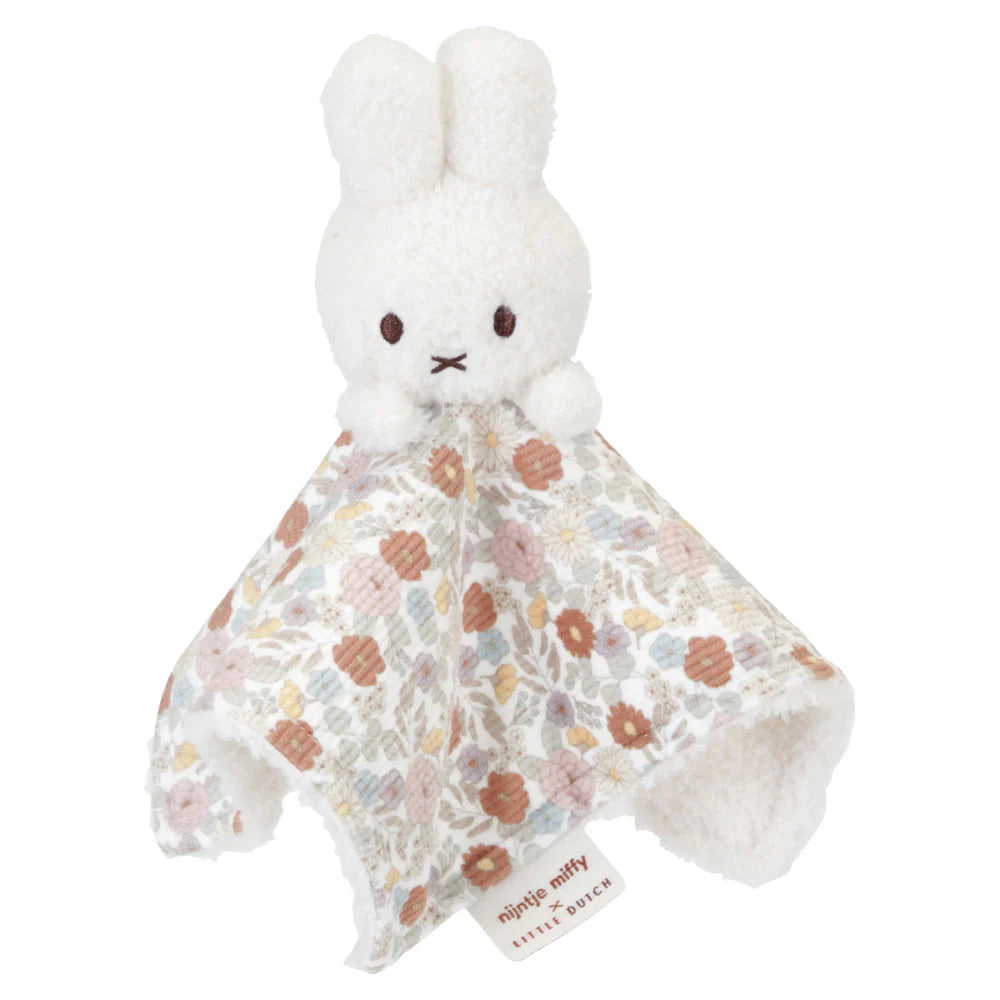 gift box with white miffy plush in floral dress, white Miffy comforter with floral design, white Miffy soft rattle with floral handle in a gift box