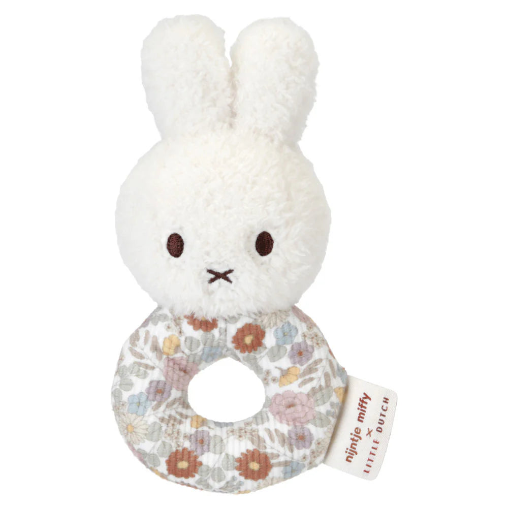 gift box with white miffy plush in floral dress, white Miffy comforter with floral design, white Miffy soft rattle with floral handle in a gift box