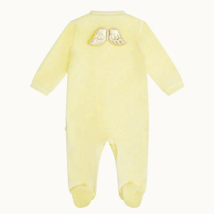 yellow velour baby sleepsuit with gold angel wings 