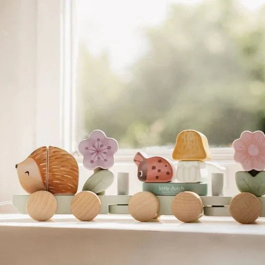 wooden pull along train stacking train with a hedgehog, flowers, ladybird, mushroom and strawberry