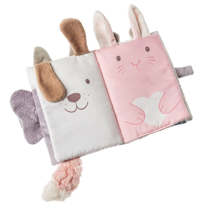 Pink and white soft sensory baby book with a foxes tale and ears