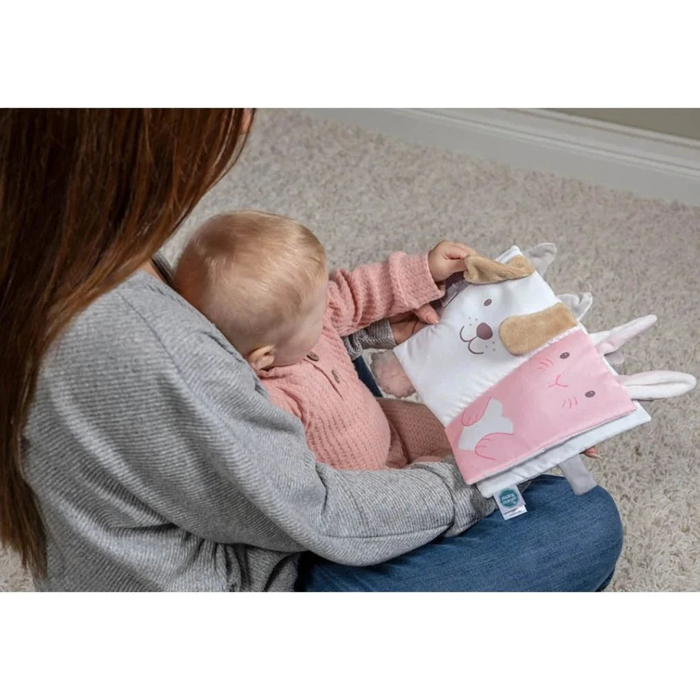 Pink and white soft sensory baby book with a foxes tale and ears