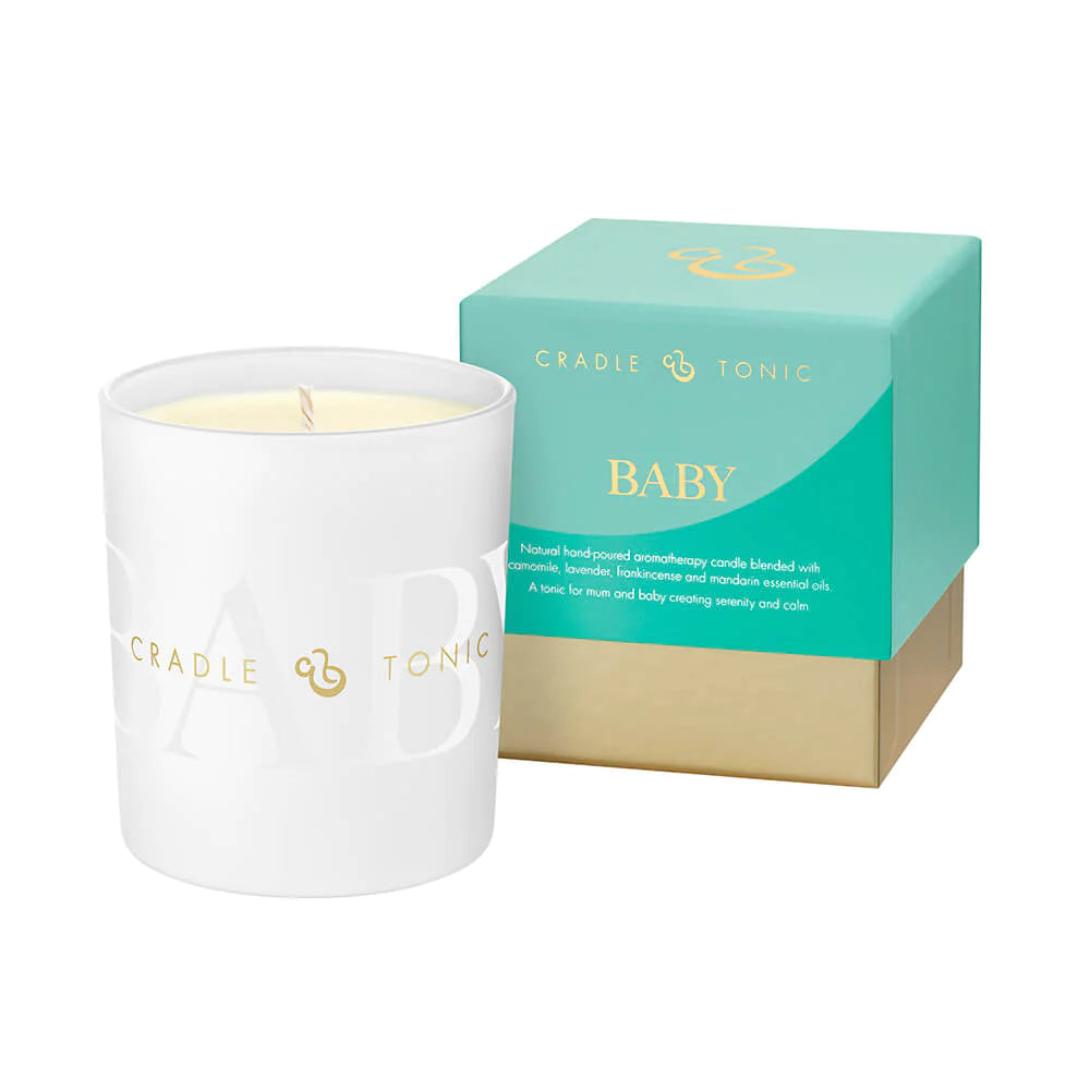 mum and baby candle in a white glass container  inside a green and gold luxury gift box