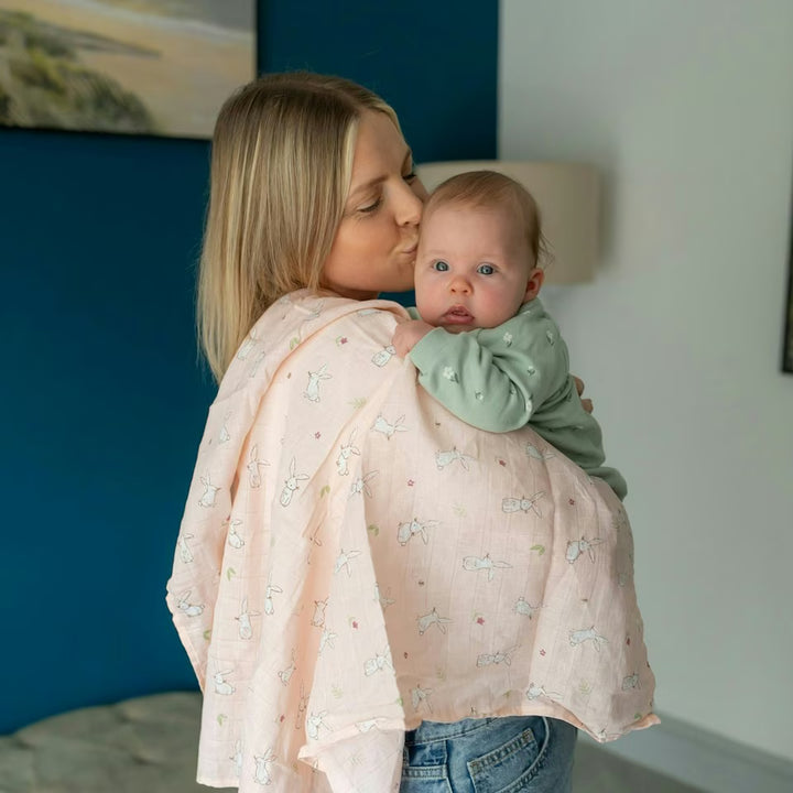 pink muslin square or baby with white rabbits 