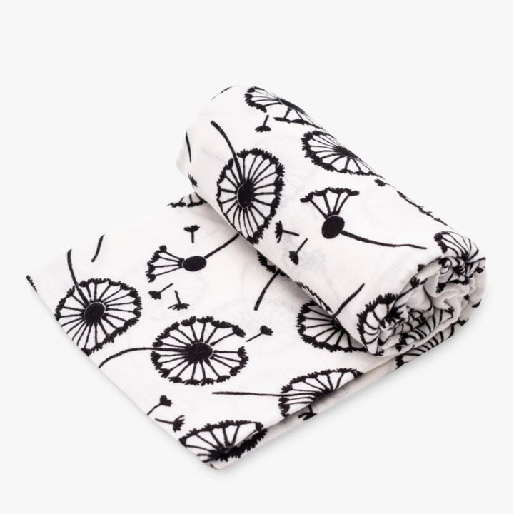 white and black baby sensory muslin with black dandelion design