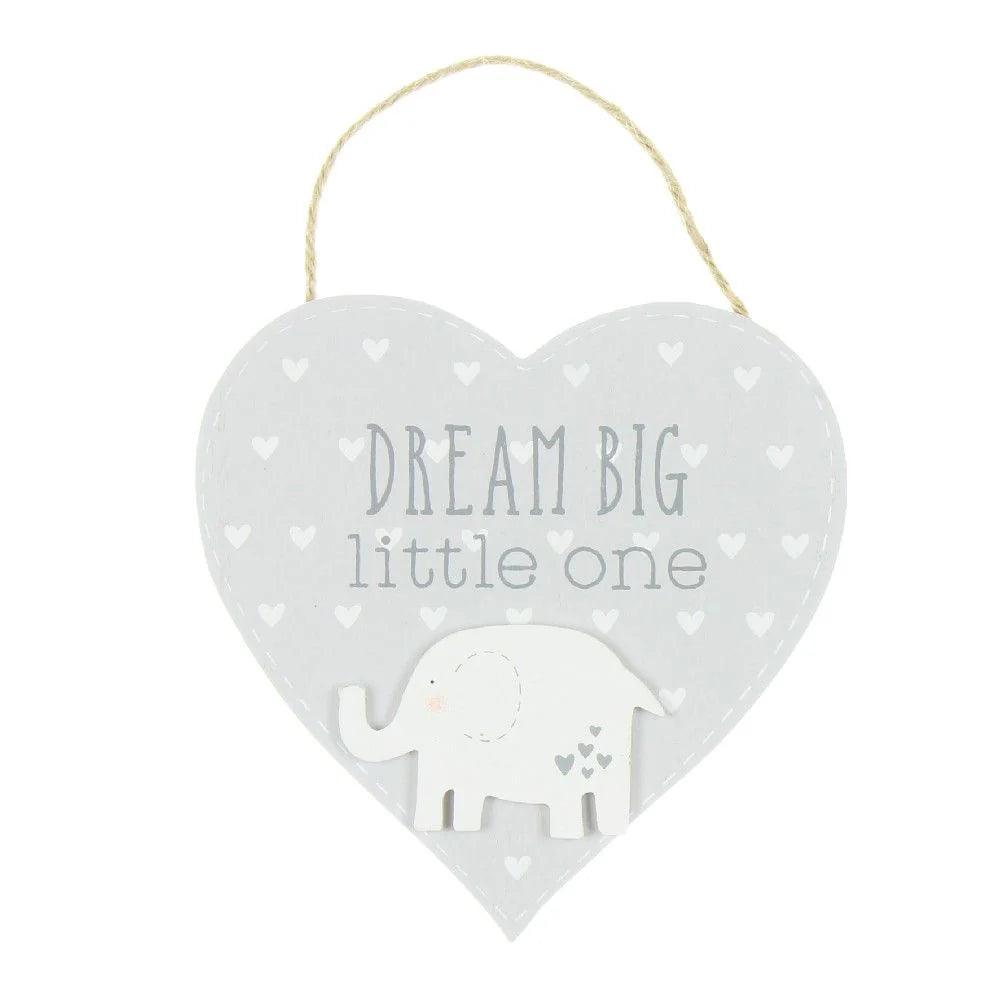 heart shaped nursery plaque in wood with grey background with hearts and a white elephant, writing on the plaque 'dream big little one 