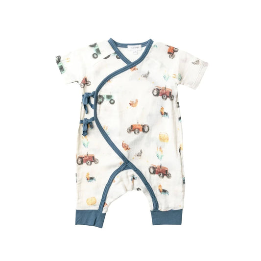 cross over baby romper in organic cotton white with red tractors and blue cuffs and ties 