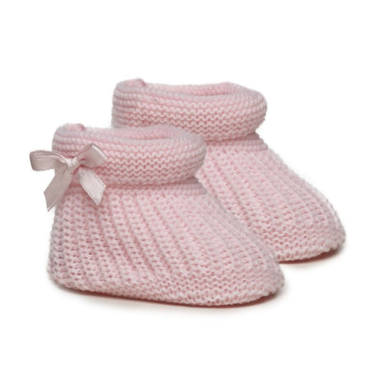 Pink knit baby booties with pink bow on the side
