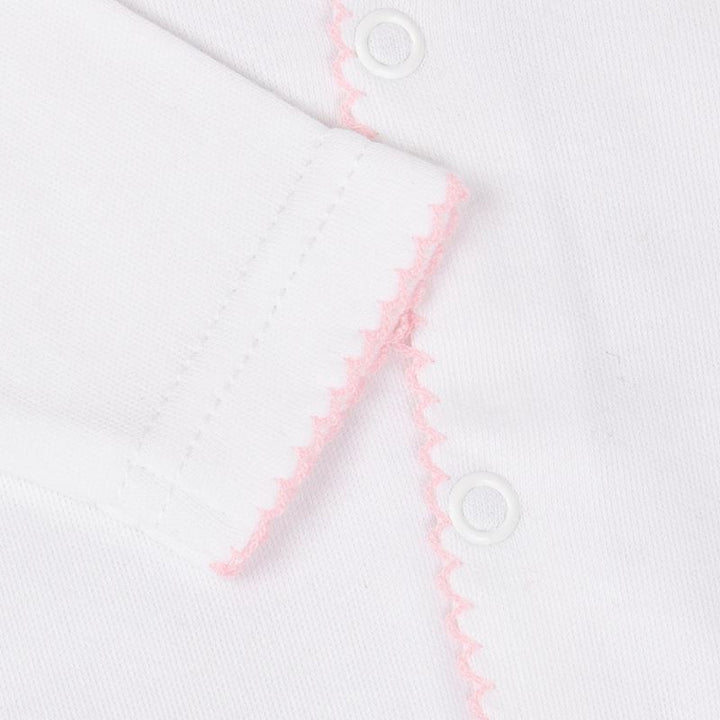 white luxury baby sleepsuit with a fawn logo and pink picot edging