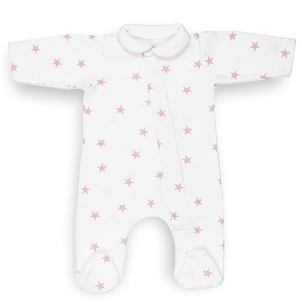 White onsie with pink stars and pink piping around the peter pan collar, magnetic closure