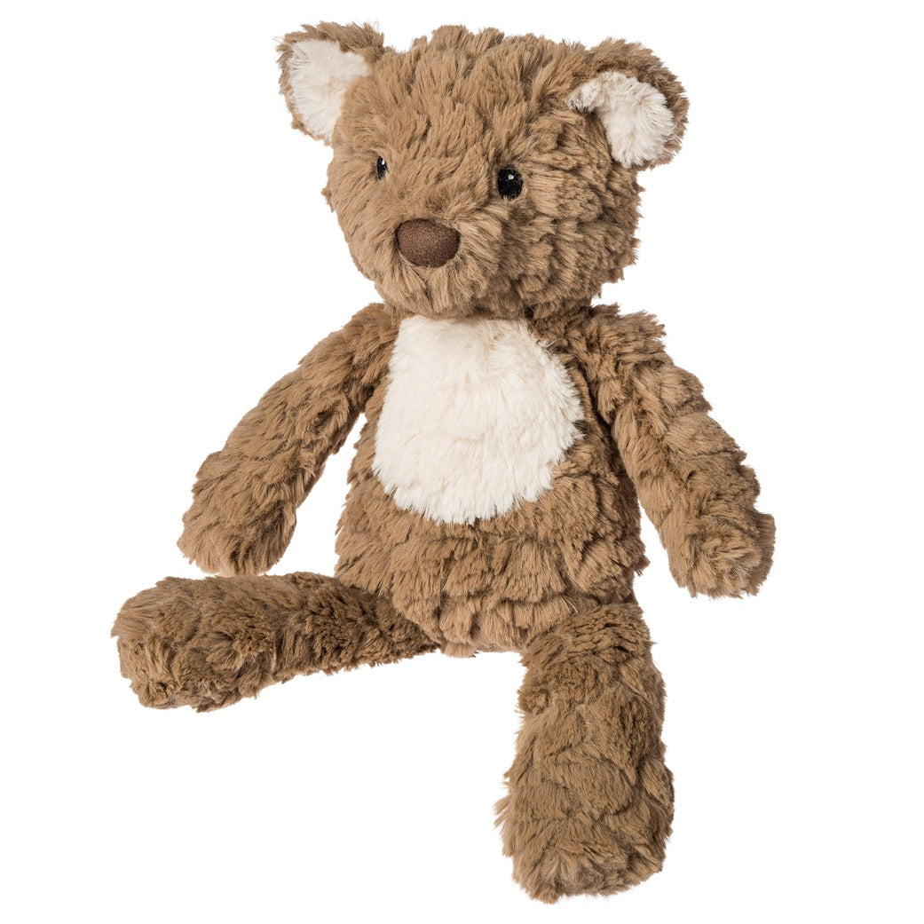 brown soft teddy with white inner ears and tummy