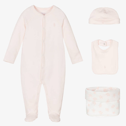 Pink baby girl sleepsuit with Ralph Lauren logo, pink baby bib with ralph lauren logo, pink organic cotton baby hat with ralph lauren logo, pink and white small basket in fabric by Ralph Lauren