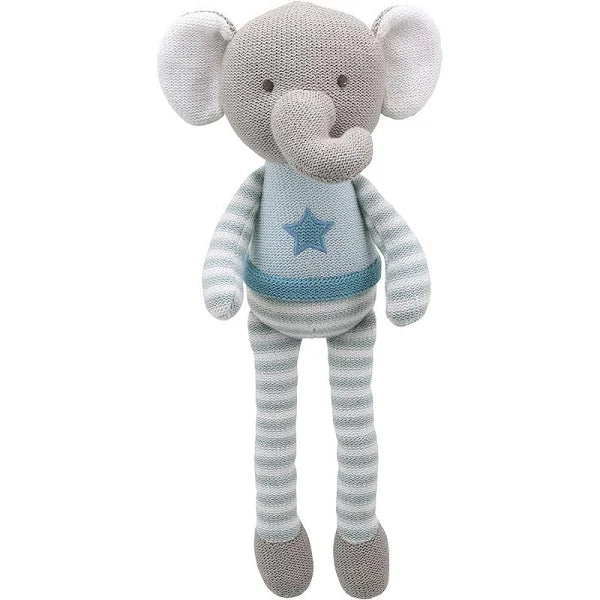 Grey and white knitted elephant toy dressed in a blue sweater with a star