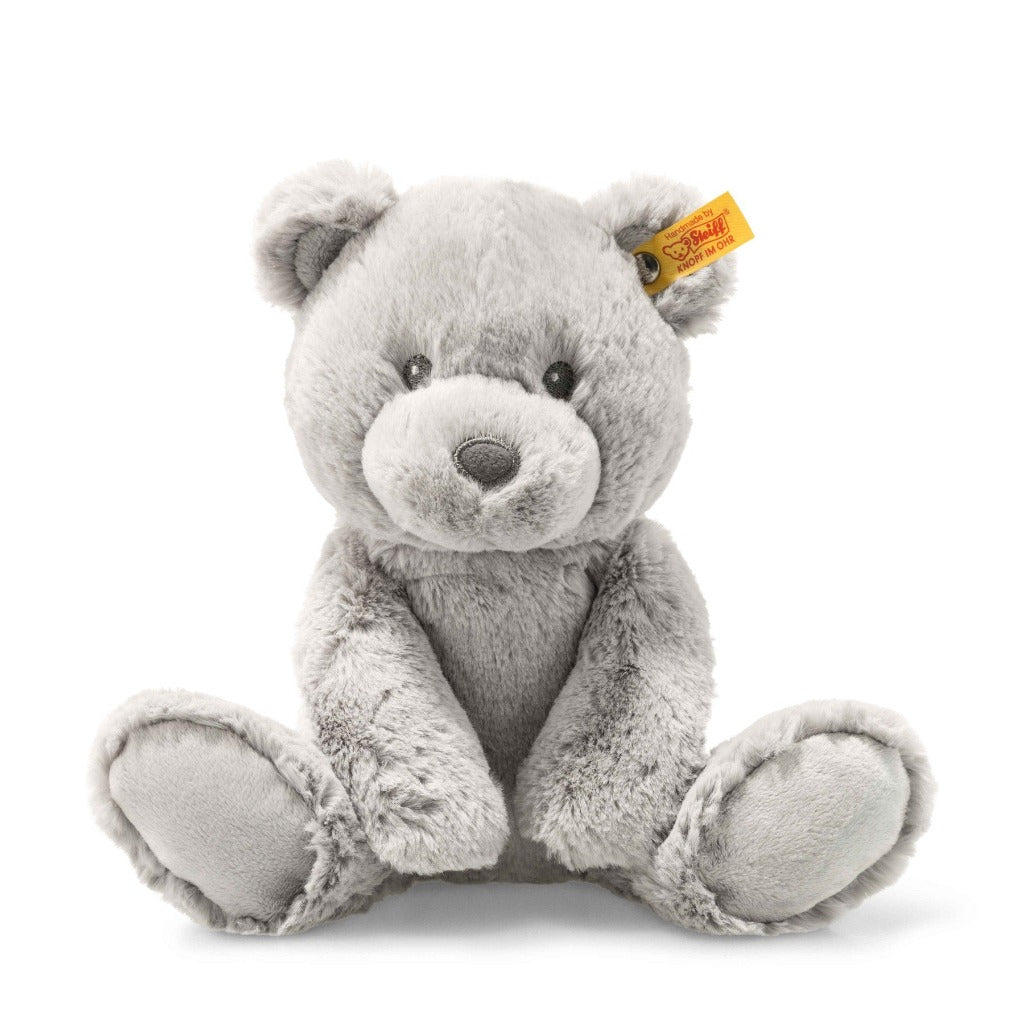 Grey soft steiff teddy bear with embroidered eyes and button in ear