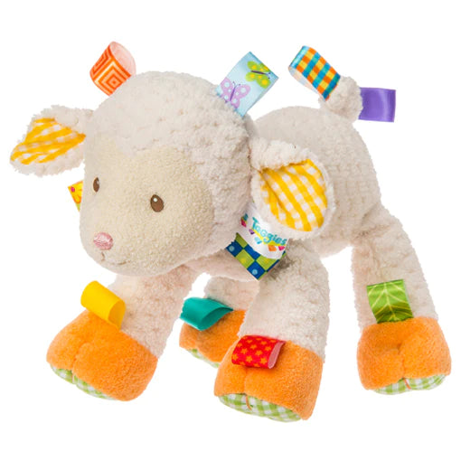 cream lamb with bright coloured taggies, orange feet and gingham soles of feet and inner ears 
