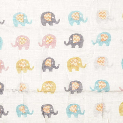 baby muslin swaddle in white with grey, blue and pink elephants