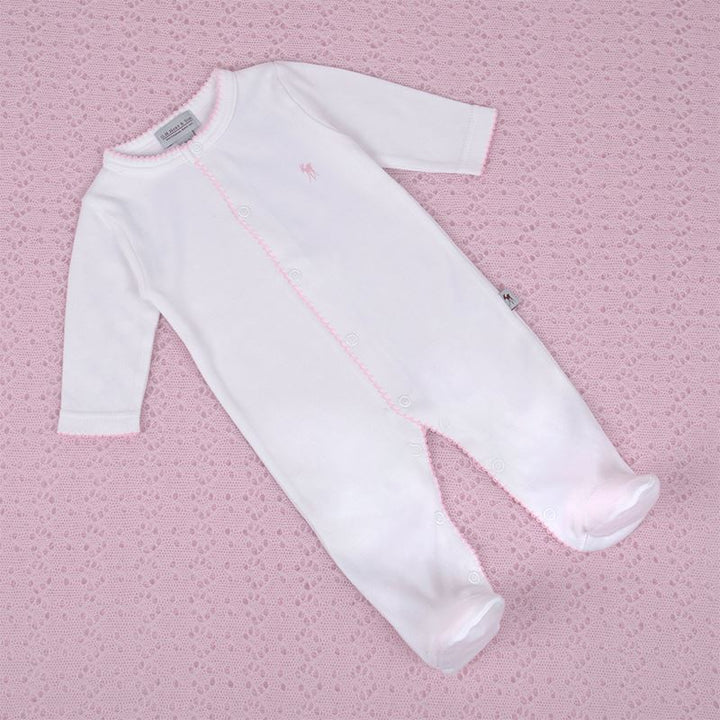 white luxury baby  sleepsuit with a fawn logo and pink picot edging 