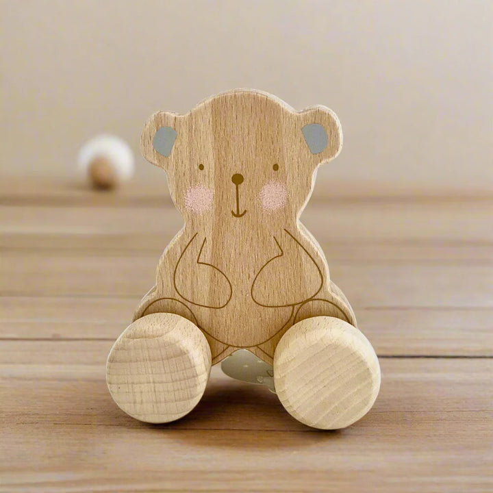 wooden baby toy on wheels 
