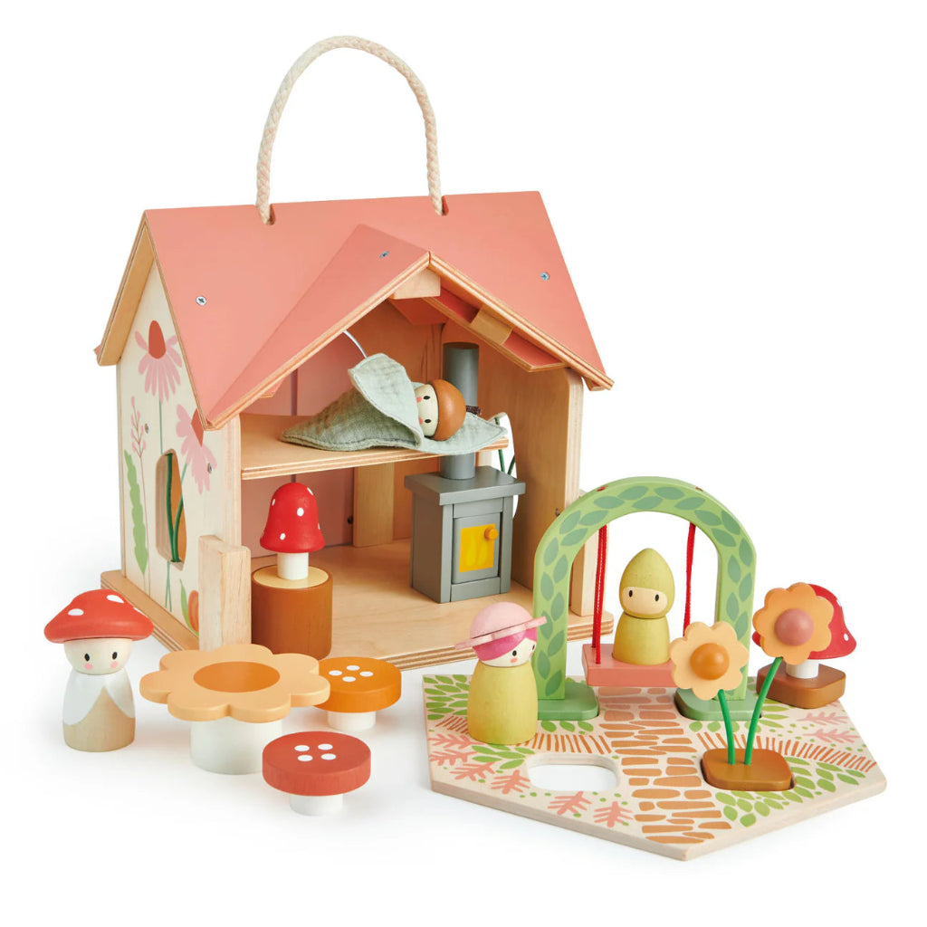 wooden dolls house with pink roof and carry handle, wooden dolls and flowers 