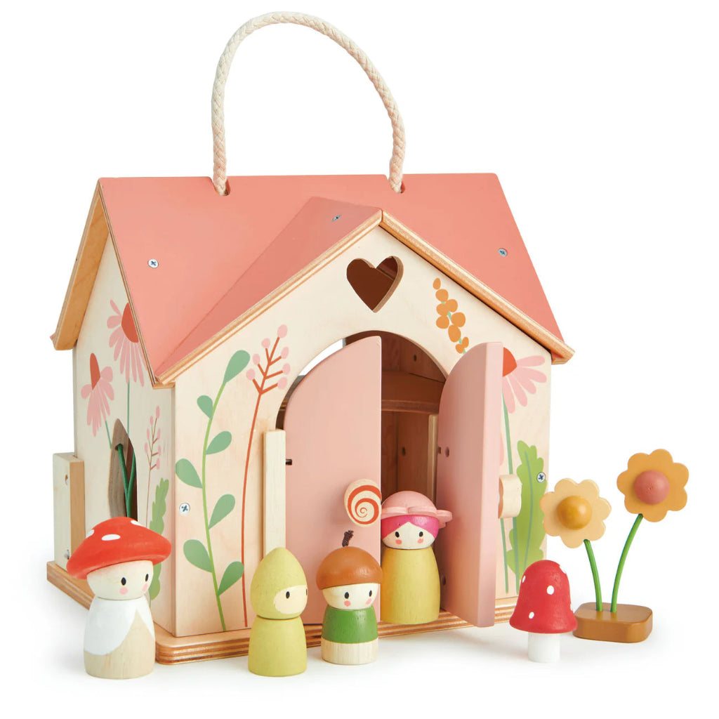 wooden dolls house with pink roof and carry handle, wooden dolls and flowers 