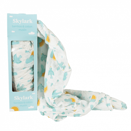 White swaddling blanket with light blue skylarks boxed 