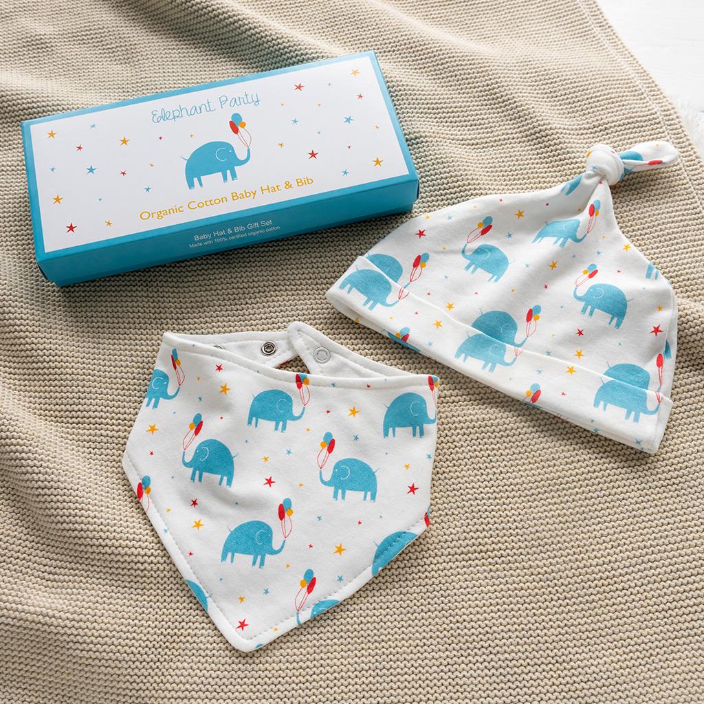 White Organic cotton knot baby hat and bib set with blue elephants in a box
