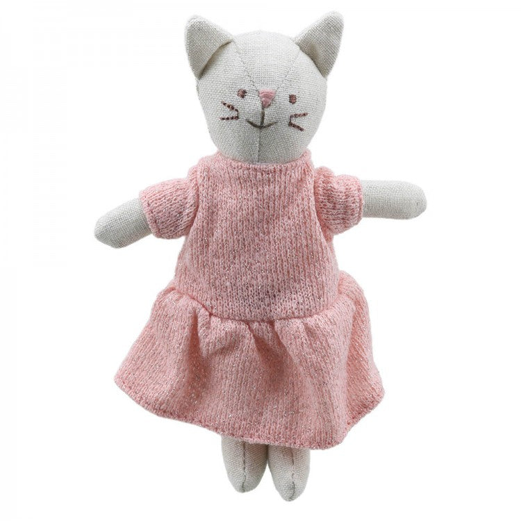 white cat soft toy in a pink dress